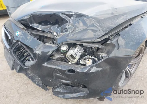 2014 BMW M6 Base (M7) z USA, uszkodzony, nr VIN WBSLZ9C52ED651041